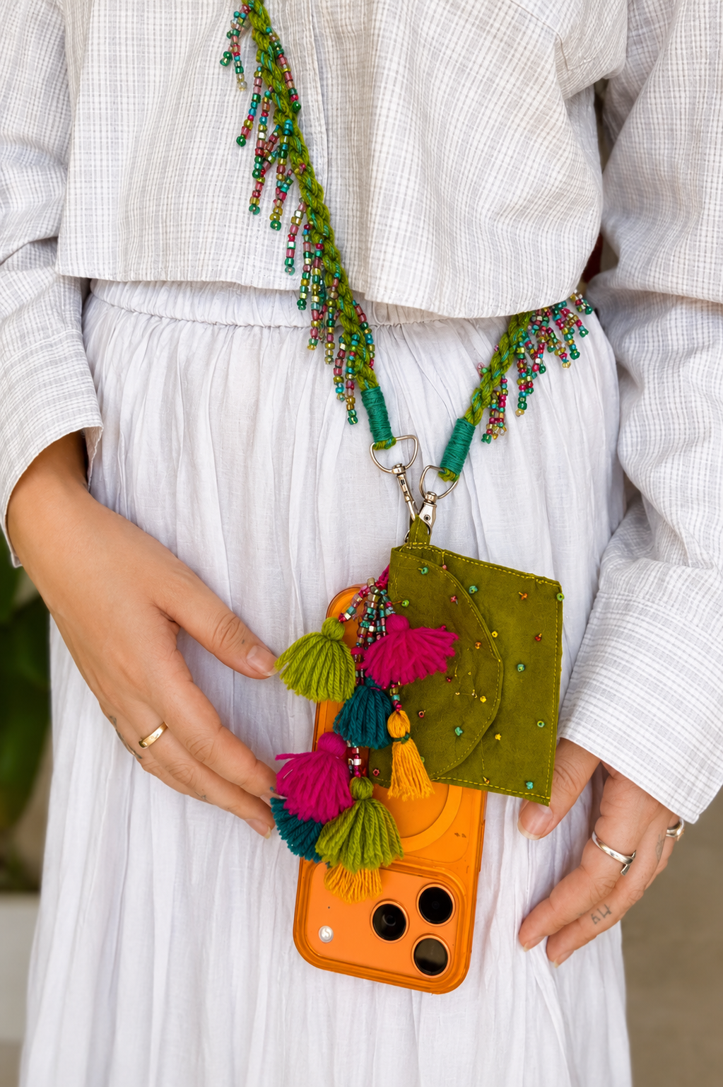 
                  
                    Poppy green mobile string
                  
                