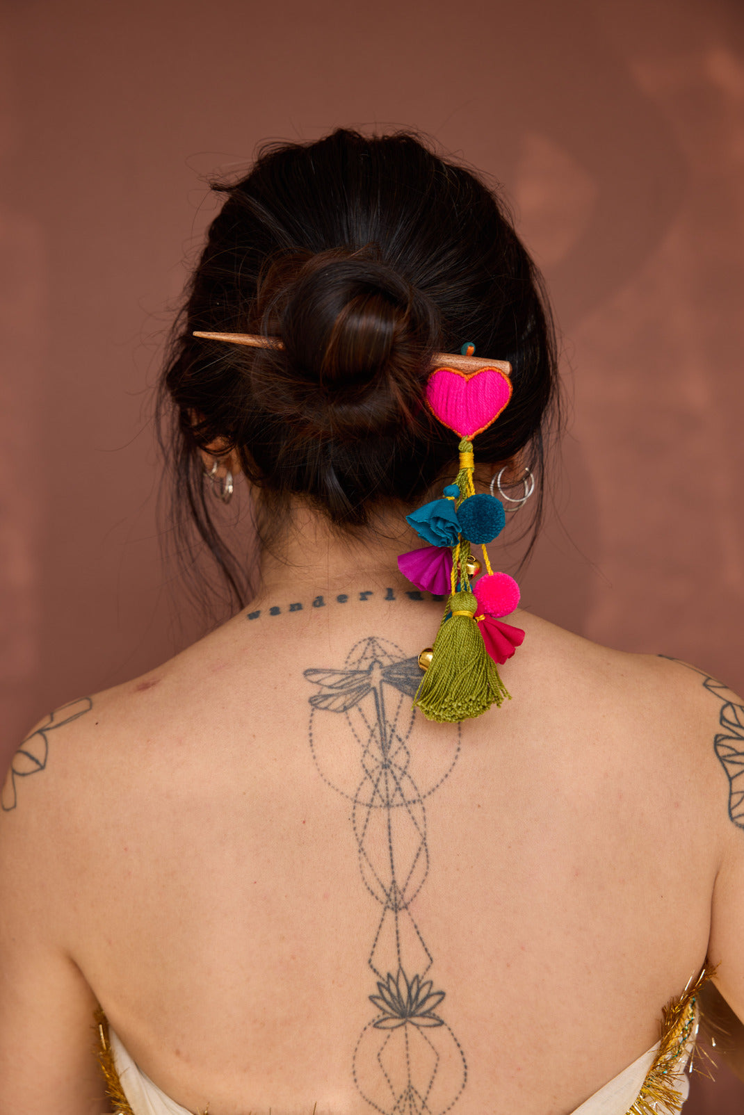 
                  
                    Vibrant Dil Pom Pom Bun Stick
                  
                