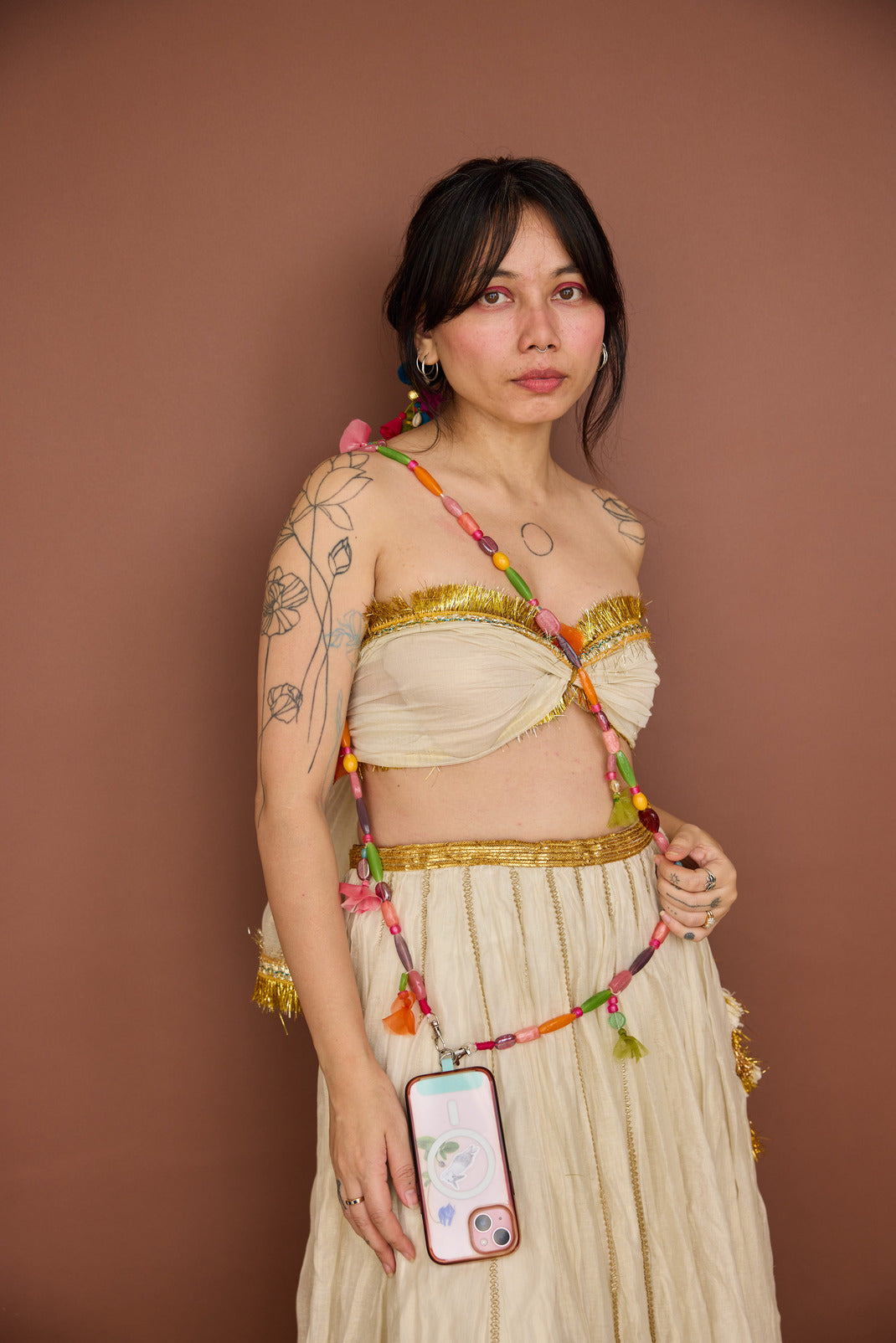 
                  
                    Rangeela Beads Mobile String
                  
                