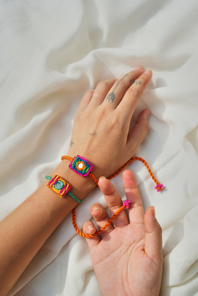 
                  
                    Aaina rakhi - set of two
                  
                