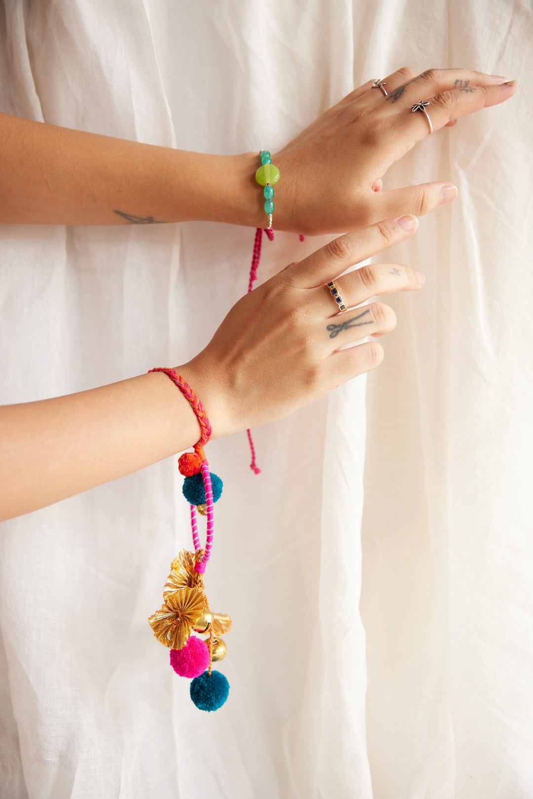 
                  
                    Dora Lumba Rakhi - Set of two
                  
                