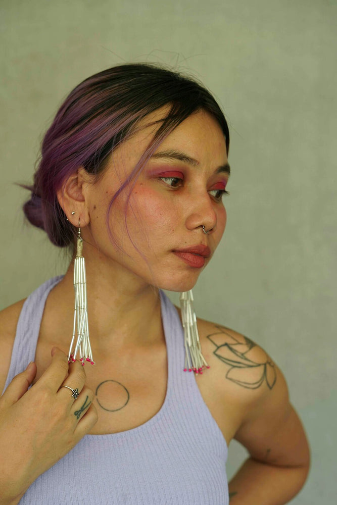 
                  
                    White Icicle Earring
                  
                